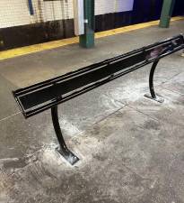 A new-style bench was installed at the West 4th Street. subway station to discourage homeless people from sleeping on benches. But the new benches also launched an avalanche of complaints on the Next Door neighborhood website, although a few posters saw their value.