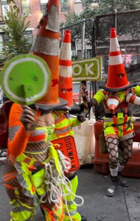 Some people in the West Village got into the Halloween spirit early in the West Village on Oct. 19, dressed as traffic directing cones.