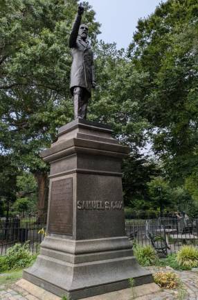 Samuel S. Cox monument in Tompkins Square Park. The chess tables, now closed to the public, can be seen at right.