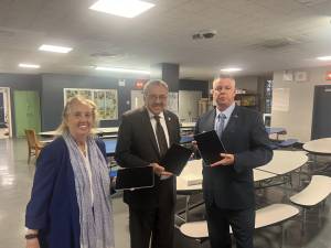 New iPads were delivered to the Micky Mantle School (P.S. 811) on December 4. Pictured: Councilmember Gale Brewer (left), HITN CEO Mike Nieves (center), and P.S. 811 principal John McCormick.