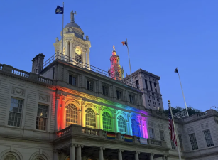<b>City Hall last year lit up for Pride Month. This year, many municipal buildings followed suit by displaying rainbow lights on June 1.</b>