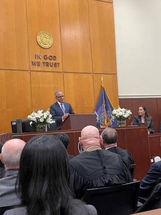 The court room was packed with well wishers at the induction ceremony of Allison Greenfield. She spent six years as the law clerk to Judge Arthur Engoron, who oversaw the Donald Trump business fraud trial.