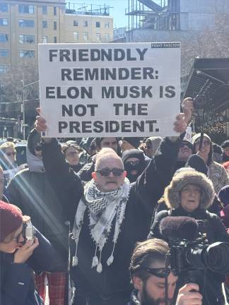 About 350 demonstrators turned out at an anti-Elon Musk rally outside a Tesla showroom in the Meatpacking district on March 8.