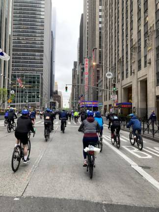 Bicylists heading up Fifth Ave. near Radio City Music Call. Photo: Lee McInnis/Facebook