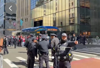 Police load pro-Palestinian demonstrators who were arrested inside Trump Tower protesting the detention of Mahmoud Khalil into buses. Some of the protestors dispersed after a warning, but 98 were taken into custody, cops said.