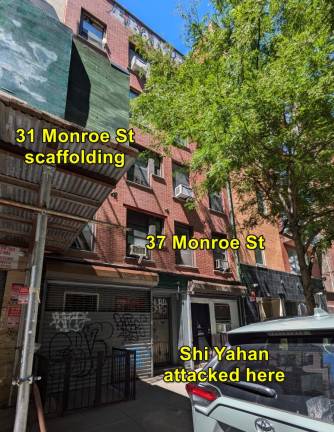 Shi Yahan was attacked outside 37 Monroe Street. The opposite (west) side of the street, where Knickerbocker Village, is fully shadowed in construction scaffolding.