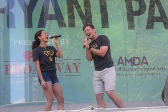 Isabelle McCalla and Ken Wulf Clark performed “Wild” from “Water for Elephants” at 2024’s first Broadway in Bryant Park concert. (click arrow &gt; to see more)