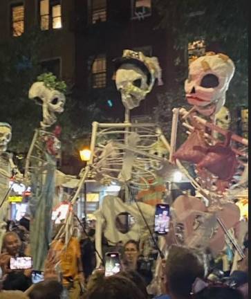 The theme of this year’s parade was “Meow” but towering skeleton puppets are always in vogue at the Greenwich Village Halloween parade on Oct. 31.