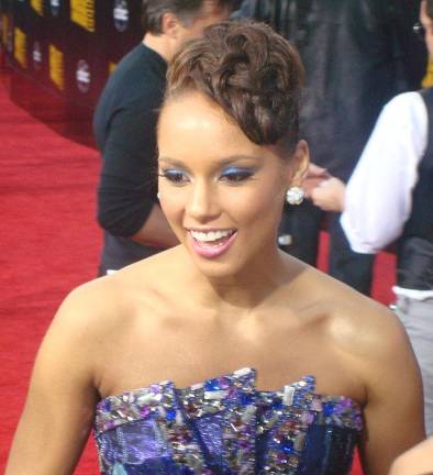 Alicia Keys, seen here at the 2009 American Music Awards red carpet, was among the many alums who rallied support to the school’s acclaimed drama program when it was forced to close last year due to budget cuts. Now thanks to a new state grant the program is saved long term