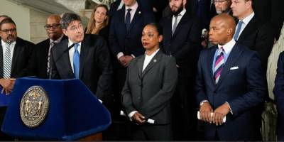 Eric Goldstein (at podium) of the United Jewish Federation with then-NYPD Commissioner Kechant Sewell (center) and Mayor Eric Adams at a press conference announcing the arrest of two individuals in Penn Station. One defendant pleaded guilty for plotting an anti-Semitic terror plot this week and could face ten years in state prison. DA Alvin Bragg (far left) looks on. Charges against a second man are still pending.