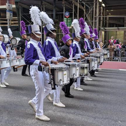 A marching band from Ankeny, Iowa, was among 300 units and floats in this year’s Veteran’s Day parade in NYC, billed as the nation’s largest such parade. Photo: Brian Berger