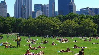 Sunbathers at Central Park, one of the City’s premier cooling stations on the Cool It! map. Emergency Management has updated citywide cooling features to prevent premature heat-related death as temperatures rise.