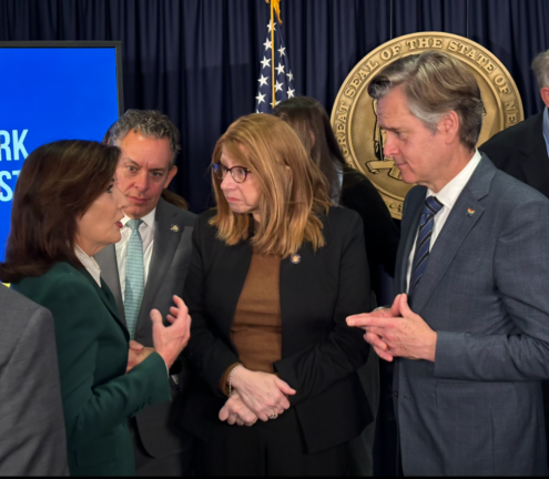 Governor Kathy Hochul (left) chats with local lawmakers including Assembly members Tony Simone (rear) and Linda Rosenthal and NYS Senator Brad Hoylman-Sigal afterannouncement she is unpausing congestion pricing toll. All three lawmakers are supportive of the toll.