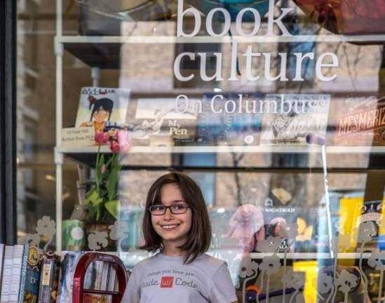 Sasha Harmon Matthews outside Book Culture on 82nd Street, and where she will read from her graphic novel, Sitting Bull: A Life Story by Sasha, on June 18. Photo: Scott Matthews