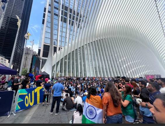 Thousands turned out to watch the Cricket championship at a watch party at the Oculus. Fans from India were the majority but plenty of curious New Yorkers also took in the action. Photo: Maksuda Aziz