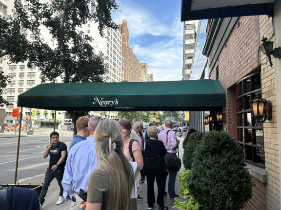 <b>A line formed outside Neary’s as the 4 p.m. opening time drew nearer on July 18, their second-to-last day of business. </b>