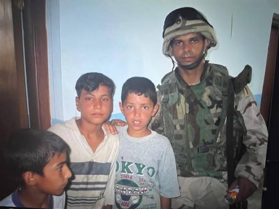 Dropping off supplies to local kids in Balad, Iraq