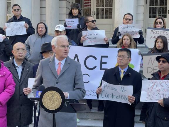 City Councilmember Bob Holden rallying in front of New York City Hall on Dec. 11, to promote a bill that would mandate licenses for e-bikes and other mopeds.