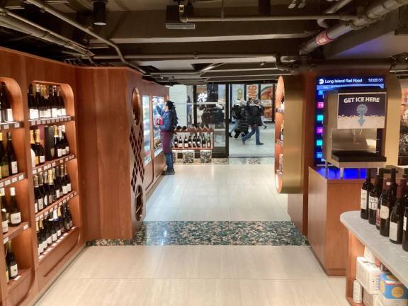 As LIRR commuters whisk by on the outside, a quiet calm exists within the walls of Penn Cellars. A large inventory of wine and spirits nest on shelves of dark mahogany wood, a rare upscale touch for a liquor store in the nation’s busiest rail hub.