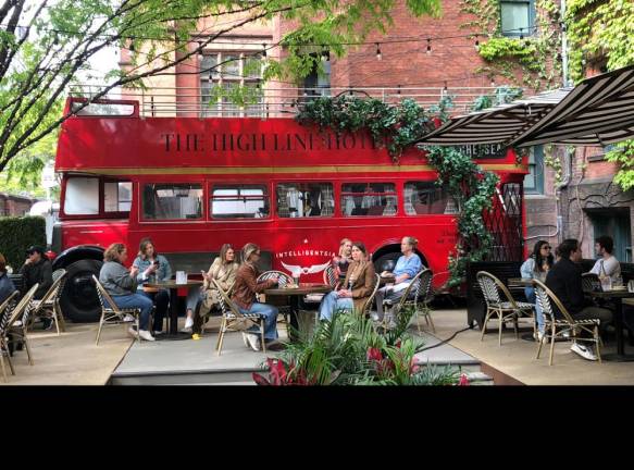 <b>Guests chillax next to Daisy on opening day on a sunny Saturday in May.</b>