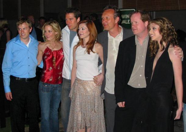 <i><a rel=nofollow href=https://commons.wikimedia.org/wiki/Michelle_Trachtenberg>Michelle Trachtenberg</a> </i>(far right) <i>at the cast wrap for <a rel=nofollow href=https://en.wikipedia.org/wiki/Buffy_the_Vampire_Slayer>Buffy the Vampire Slayer</a></i> , in which she co-starred with (left to right) <a rel=nofollow href=https://commons.wikimedia.org/wiki/Tom_Lenk>Tom Lenk</a>, <a rel=nofollow href=https://commons.wikimedia.org/wiki/Emma_Caulfield>Emma Caulfield</a>, <a rel=nofollow href=https://commons.wikimedia.org/wiki/Alexis_Denisof>Alexis Denisof</a>, <a rel=nofollow href=https://commons.wikimedia.org/w/index.php?title=Alyson_Hannigan&amp;action=edit&amp;redlink=1>Alyson Hannigan</a>, <a rel=nofollow href=https://commons.wikimedia.org/wiki/Anthony_Stewart_Head>Anthony Stewart Head</a>, and <a rel=nofollow href=https://commons.wikimedia.org/wiki/Joss_Whedon>Joss Whedon</a>. Trachtenberg played pesky Dawn Summers in the popular teen series.