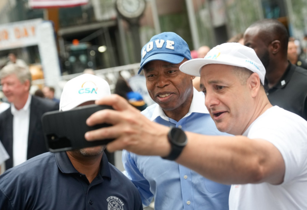 Mayor Eric Adams marching in September 8’s Labor Day Parade, one day before he announced that he had tested positive for COVID-19.