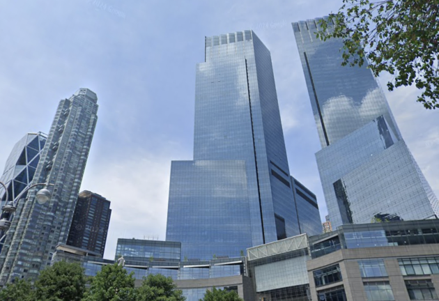 The skyscraper that the scaffolding was hanging from (left) is one of two Time Warner Center residential buildings.