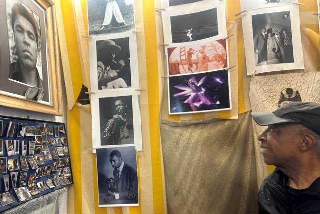 He frequently photographed jazz greats but one of his favorite photos is one he took of a defiant Mohammed Ali at the Apollo Theater after he had been stripped of his boxing titles for refusing to be drafter during the Vietnam War. Photo: Christian Spencer