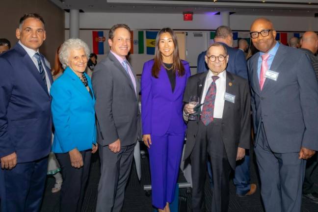 (From l or r) 32BJ SEIU Secretary Treasurer John Santos, Straus Media President Jeanne Straus, 32BJ SEIU President Manny Pastreich, New York State Assembly Member Grace Lee, United States Congressman Jerrold Nadler and NY1’s Errol Louis at the pre-event cocktail reception. Photo: Steven Strasser