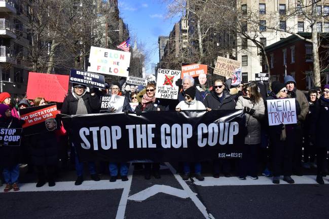 A crowed estimated at 1,000 people turned out to protest Elon Musk and Donald Trump policies.