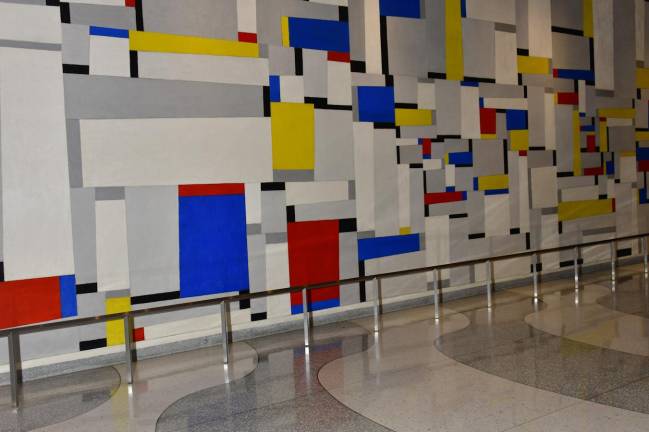 Fritz Glarner mural, Relational Painting No. 88, in the Time-Life Building lobby. The floor pavement echoes the undulating pattern of the plaza outside.