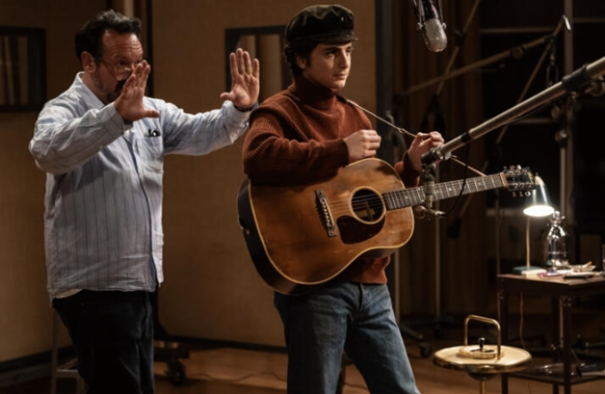 Director James Mangold and Timothée Chalamet on the set of “<i>A Complete Unknown.”</i>