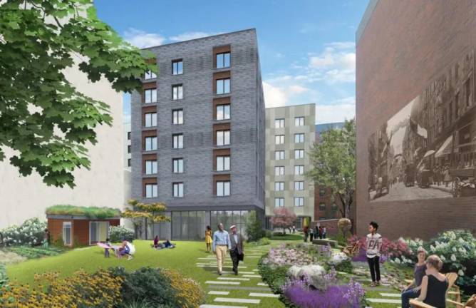 Artist rendition of the 123 unit-affordable housing complex and accompanying public park space that the Adams Administration wants to place on the one acre site that now houses the Elizabeth Street Garden. There would be commercial retail space and offices for Habitat for Humanity on the ground floor.