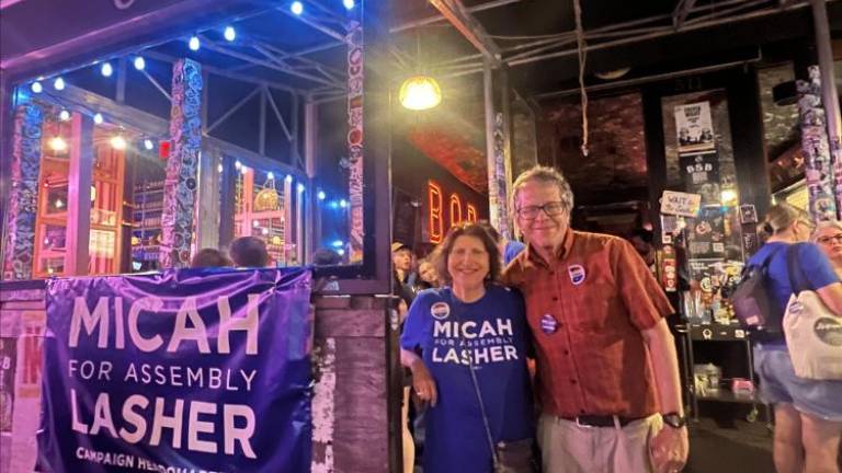 Deborah Thomas, member of the Three Parks Independent Democrats Club and Curtis Arluck, district leader of The Broadway Democrats Club seen at the victory party for Micah Lasher on June 25.
