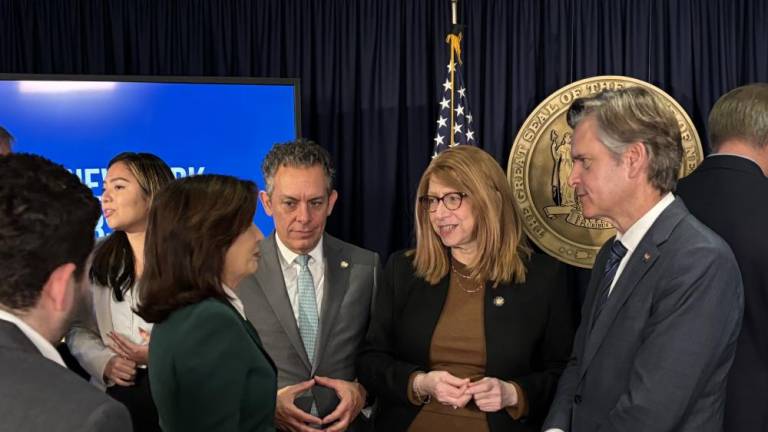 Local Manhattan political leaders including assembly members Tony Simone (to the right of Hochul) and Linda Rosenthal and NYS Senator Brad Hoylman-Sigal gathered around Gov. Kathy Hochul on the day she unveiled that she was “unpausing” the congestion pricing plan, but lowering the maximum toll charged to $9 from its original $15. Two federal judges recently refused to issue preliminary injunctions to halt its start-up on Jan. 5.