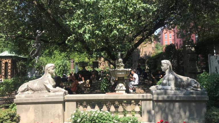 The Sphinx statues at the entrance to the Elizabeth Street Garden have been saved by a last minute stay of execution when a city judge halted, at least for now, the eviction order that the city issued Oct. 2 and which was supposed to take effect on Oct. 17.