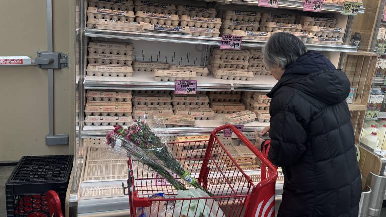 A shopper named Ginny at Trader Joe’s on Jan. 29 was picking up two cartons of eggs. She said on earlier visits the shelves were devoid of the organic eggs she buys.