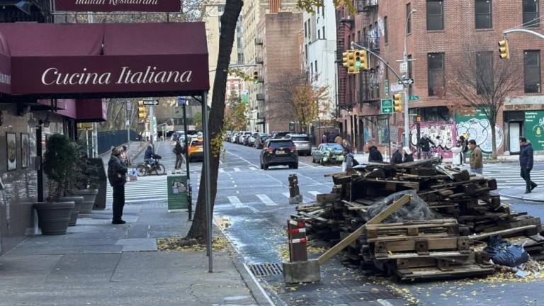 A torn-down dining shed outside Cucina Italiana, a restaurant in Chelsea. Remaining roadside dining sheds in NYC were supposed to come down for the winter on Nov. 29.