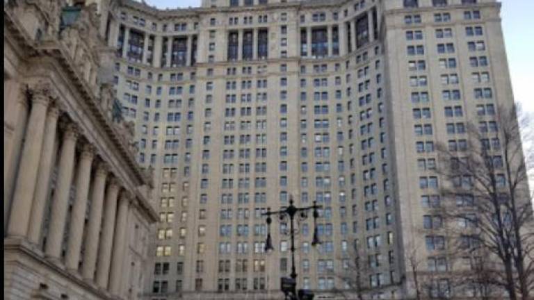 A 19 -year-old outside the New York State municipal court building at 1 Center St. One person was stabbed in the neck in an apparent random attack shortly before noon on Oct. 16. Police arrested a 51-year-old ex-con from Harlem later that day and charged him with attempted murder.